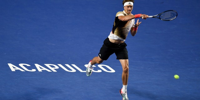 Alexander Zverev of Germany hits a return during men's singles first round at the 2022 ATP Mexican Open tennis tournament in Acapulco, Mexico, Feb. 22, 2022.