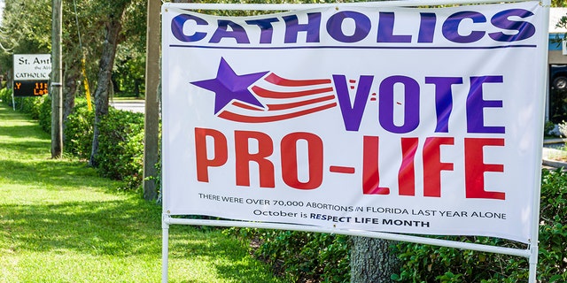 Florida, Brooksville, St. Anthony Church, Catholics vote pro-life banner. (Photo by: Jeffrey Greenberg/Education Images/Universal Images Group via Getty Images)