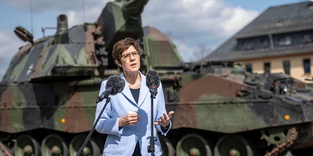 IDAR-OBERSTEIN, GERMANY - MARCH 26: German Defense Minister Annegret Kramp-Karrenbauer speaks to the media in front of a Panzerhaubitze 2000 after she visits the Bundeswehr's training unit of the 345th Artillery Battalion on March 26, 2021 in Idar-Oberstein, Germany. (Photo by Thomas Lohnes/Getty Images)