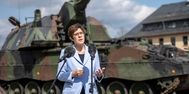 IDAR-OBERSTEIN, GERMANY - MARCH 26: German Defense Minister Annegret Kramp-Karrenbauer speaks to the media in front of a Panzerhaubitze 2000 after she visits the Bundeswehr's training unit of the 345th Artillery Battalion on March 26, 2021 in Idar-Oberstein, Germany. (Photo by Thomas Lohnes/Getty Images)