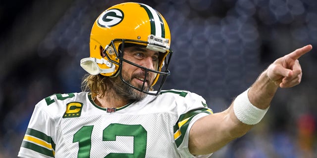Rodgers warms up before the game against the Detroit Lions at Ford Field in Detroit, Michigan, on Jan. 9, 2022. 