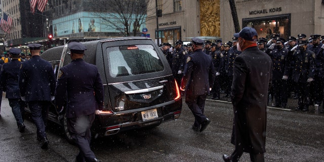 New York City mayor Eric Adams floors the Hearst carrying the body of police officer Jason Rivera after his funeral on January 28, 2022 along Fifth Avenue. (Photo by Andrew Lichtenstein/Corbis via Getty Images)