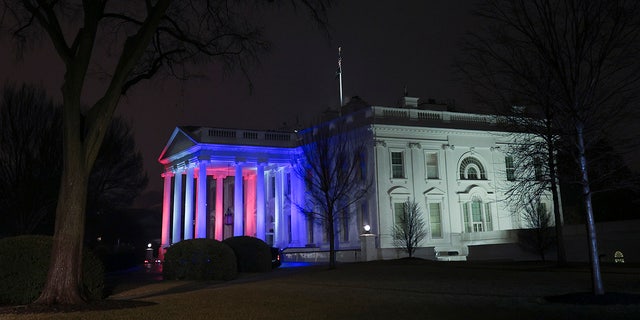 The White House is illuminated in red, white and blue in support of the Team USA Olympians and Paralympians on February 03, 2022 in Washington, DC.