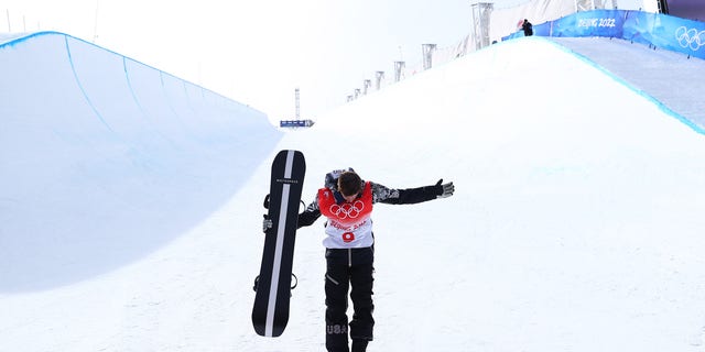 Shaun White of Team United States acknowledges spectators after finishing fourth during the Men's Snowboard Halfpipe Final on day 7 of the Beijing 2022 Winter Olympics at Genting Snow Park on Feb. 11, 2022, in Zhangjiakou, China. 