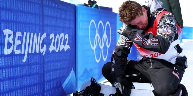 Shaun White of Team United States shows emotion after finishing fourth during the Men's Snowboard Halfpipe Final on day 7 of the Beijing 2022 Winter Olympics at Genting Snow Park on Feb. 11, 2022, in Zhangjiakou, China. 