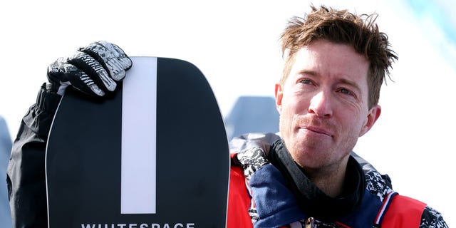 Shaun White of Team United States shows emotion speaking with the press after finishing fourth during the Men's Snowboard Halfpipe Final on day 7 of the Beijing 2022 Winter Olympics at Genting Snow Park on Feb. 11, 2022, in Zhangjiakou, China. White competed in five Winter Olympic Games and had announced Beijing 2022 will be the last one of his career. 