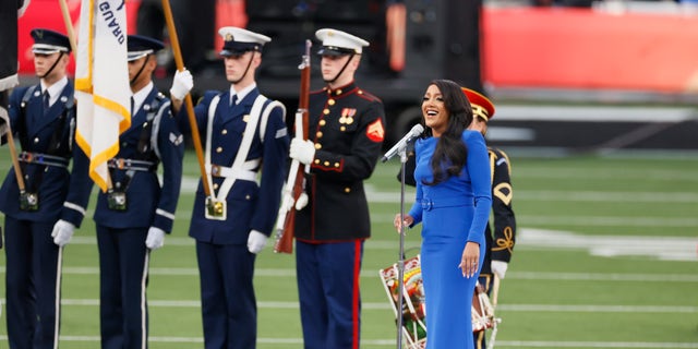 Singer Mickey Guyton performs the national anthem before Super Bowl LVI.