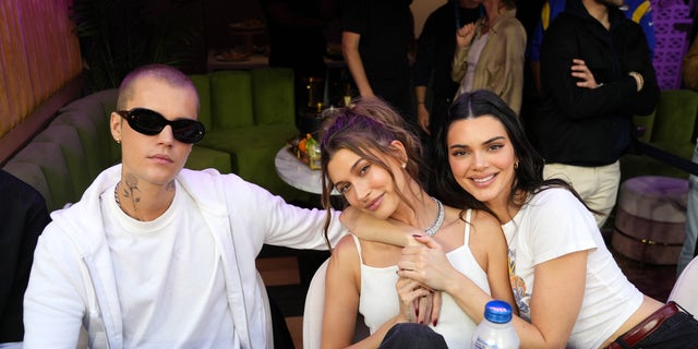 Justin Bieber, Hailey Bieber and Kendall Jenner attend Super Bowl LVI at SoFi Stadium on February 13, 2022 in Inglewood, California.