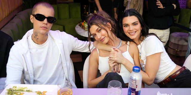 Justin Bieber, Hailey Bieber and Kendall Jenner attend Super Bowl LVI at SoFi Stadium on February 13, 2022 in Inglewood, California.