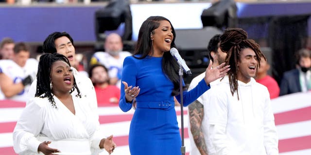 INGLEWOOD, CALIFORNIA - FEBRUARY 13: Mickey Guyton performs the national anthem at Super Bowl LVI at SoFi Stadium on February 13, 2022 in Inglewood, California.  (Photo by 