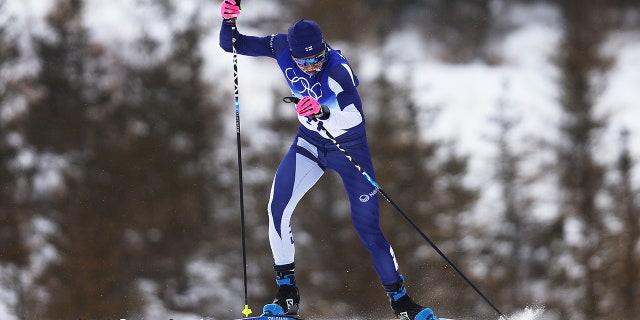 Remi Lindholm of Team Finland competes during the Men's Cross-Country Skiing 50km Mass Start Free on Day 15 of the Beijing 2022 Winter Olympics at The National Cross-Country Skiing Centre on February 19, 2022, in Zhangjiakou, China. The event distance has been shortened to 30k due to weather conditions.