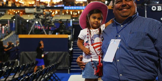 Texas legislator Ryan Guillen with his daughter at the 2012 Democratic National Convention. Guillen is now a Republican. 