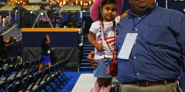 Texas legislator Ryan Guillen with his daughter at the 2012 Democratic National Convention. Guillen is now a Republican.