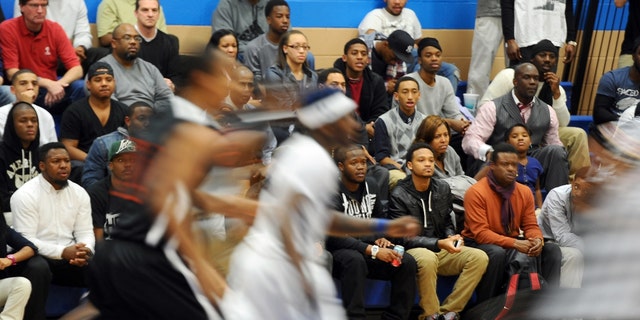 Patterson High school basketball phenom Aquille Carr takes on City College High School Dec. 19, 2011, in Baltimore.