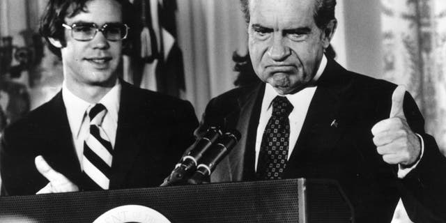 Richard Nixon (1913 - 1994) gives the thumbs up after his resignation as 37th President of the United States. His son-in-law David Eisenhower is with him as he says goodbye to his staff at the White House, Washington DC.   (Photo by Gene Forte/Consolidated News Pictures/Getty Images)