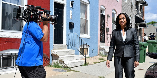 Baltimore State's Attorney Marilyn Mosby is interviewed by NBC News while walking through the city's Sandtown-Winchester neighborhood, Aug. 24, 2016.  