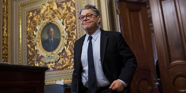Then-Sen.  Al Franken, D-Minn., Leaves the Democratic Senate Policy luncheon in the Capitol on December 12, 2017. (Photo By Tom Williams / CQ Roll Call)