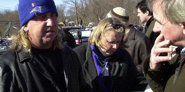 Jack Russell, lead singer of the band Great White, speaks to reporters after a deadly fire at The Station nightclub Feb. 21, 2003, in West Warwick, Rhode Island. Fire broke out during the performance and pyrotechnic display by the '80s band. Russell said that the flames from the pyrotechnic display spread to foam decorations around the stage. The band's guitarist Ty Longly was missing at the time. He died.