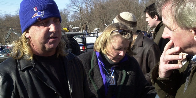 Jack Russell, lead singer of the band Great White, speaks to reporters after a deadly fire at The Station nightclub Feb. 21, 2003, in West Warwick, Rhode Island. Fire broke out during the performance and pyrotechnic display by the '80s band. Russell said that the flames from the pyrotechnic display spread to foam decorations around the stage. The band's guitarist Ty Longly was missing at the time. He died.