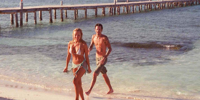 Pamela Anderson and Tommy Lee on the beach after their wedding in Cancun, Mexico, February 1995.