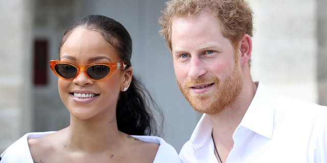 Rihanna and Prince Harry attend the 'Man Aware' event held by the Barbados National HIV/AIDS Commission on the eleventh day of an official visit on December 1, 2016, in Bridgetown, Barbados.  Prince Harry's visit to the Caribbean marks the 35th anniversary of independence in Antigua and Barbuda and the 50th anniversary of independence in Barbados and Guyana. 