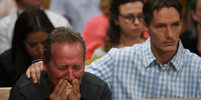 Frank Rzucek, left, the father of Shanann Watts, and Shanann's brother Frankie Rzucek were in court for the Christopher Watts arraignment hearing at the Weld County Courthouse, Aug. 21, 2018, in Greeley, Colorado. 