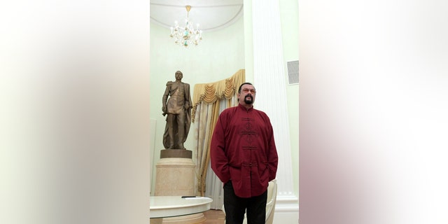 Hollywood actor Steven Seagal looks on ahead of a meeting with Russia's President Vladimir Putin (not seen) at the Kremlin in Moscow, Russia on November 25, 2016.