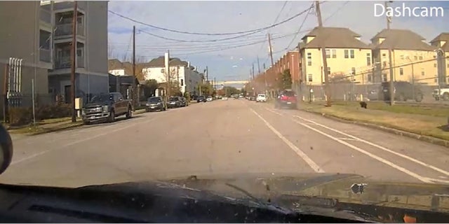 Bullets hit a Houston police vehicle during a Jan. 27 shootout between officers and a carjacking suspect, according to footage released by authorities.