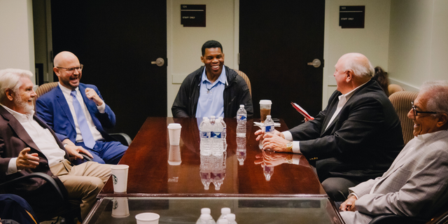 Herschel Walker participates in a roundtable with business leaders in Savannah, Georgia.