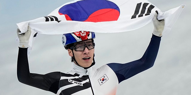 2022 Winter Olympics: South Korean gold medalist Hwang Dae-heon hopes for 'fried chicken pension' 3 Hwang Dae-heon of South Korea celebrates after winning his men's 1500 meters final during the short track speed skating competition at the 2022 Winter Olympics, Wednesday, Feb. 9, 2022, in Beijing.