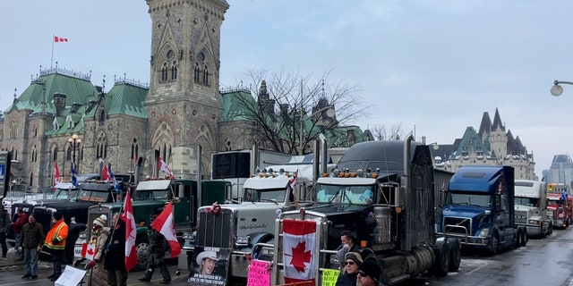 Trucks line the street in Ottawa, Canada at the