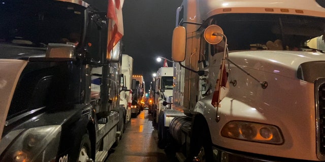 Trucks line the downtown streets of Ottawa on the 14th day of the