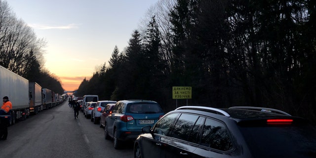 Marotta captured cars lined up in Ukraine hoping to leave the country.