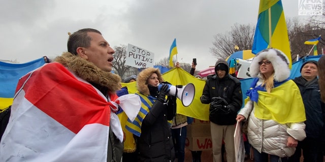 Ukraine supporters chant "Stop the war" outside the White House