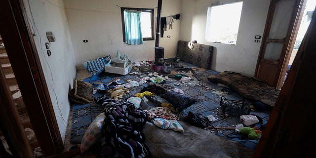 A damaged room and windows are seen inside a house after an operation by the U.S. military in the Syrian village of Atmeh. (AP Photo/Ghaith Alsayed)