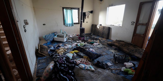A damaged room and windows are seen inside a house after an operation by the U.S. military in the Syrian village of Atmeh. (AP Photo/Ghaith Alsayed)