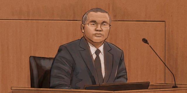 In this courtroom sketch, former Minneapolis Police Officer Tou Thao testifies during his trial in the killing of George Floyd in federal court in St. Paul, Minn., on Tuesday, Feb. 15, 2022.