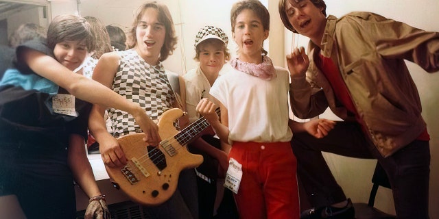 JT Harding as a child, with some of his closest friends (he wears the red pants).