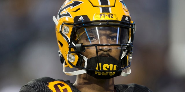 Jayden Daniels of the Arizona State Sun Devils warms up before a game against the BYU Cougars on September 18, 2021 at LaVell Edwards Stadium in Logan, Utah.