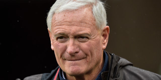 Cleveland Browns owner Jimmy Haslam watches players warm up for an NFL game against the Detroit Lions in Cleveland, Ohio, on Nov. 21, 2021.