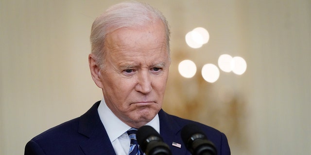 President Biden listens to questions from reporters while speaking about the Russian invasion of Ukraine at the White House on Feb. 24, 2022.