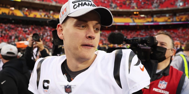 Quarterback Joe Burrow of the Cincinnati Bengals celebrates the Bengals' overtime win against the Kansas City Chiefs in the AFC Championship Game at Arrowhead Stadium Jan. 30, 2022, a Kansas City, Mo.