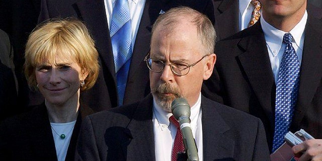 U.S. Attorney John Durham, center, outside federal court in New Haven, Conn.