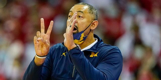 Michigan head coach Juwan Howard directs his team during the first half of an NCAA basketball game against Wisconsin Feb. 20, 2022, in Madison, Wis. Wisconsin won 77-63.