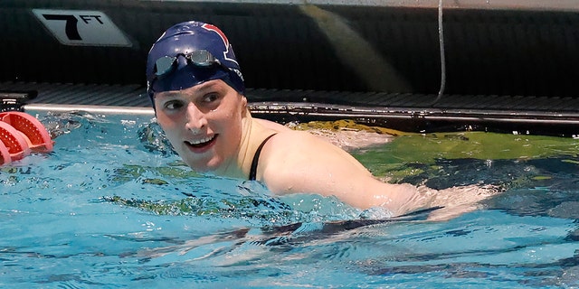 Lia Thomas of Pennsylvania smiles after winning the 100-yard freestyle final at the Ivy League Women's Swimming and Diving Championships at Harvard University, Saturday, Feb. 19, 2022, in Cambridge, Massachusetts.