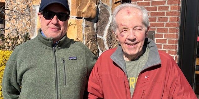 Veteran Ed Norton (at right, in red jacket) with a good friend and neighbor, John Vino, who takes him to church and helps him with errands.