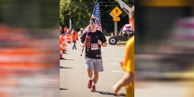 Michael Ferrara, a student running an ultra marathon in support of veterans.