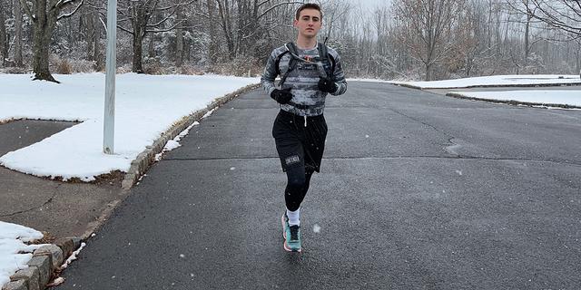 Michael Ferrara, a student running an ultra marathon in support of veterans.