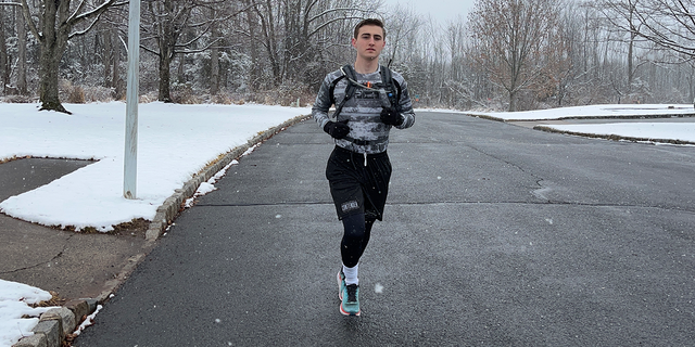 Michael Ferrara, a student running an ultra marathon in support of veterans.