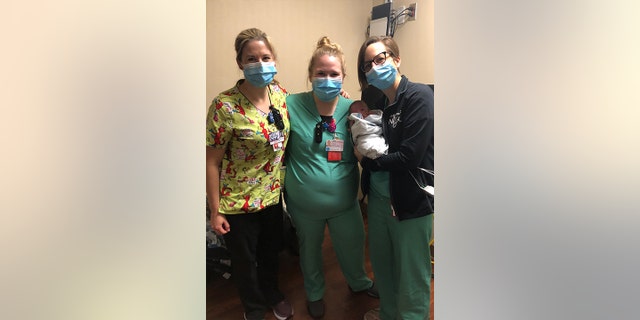 Dr. Jennifer Anderson, neonatologist and medical director at Pediatrix Neonatology of New Mexico, with her team caring for Jari Lopez.